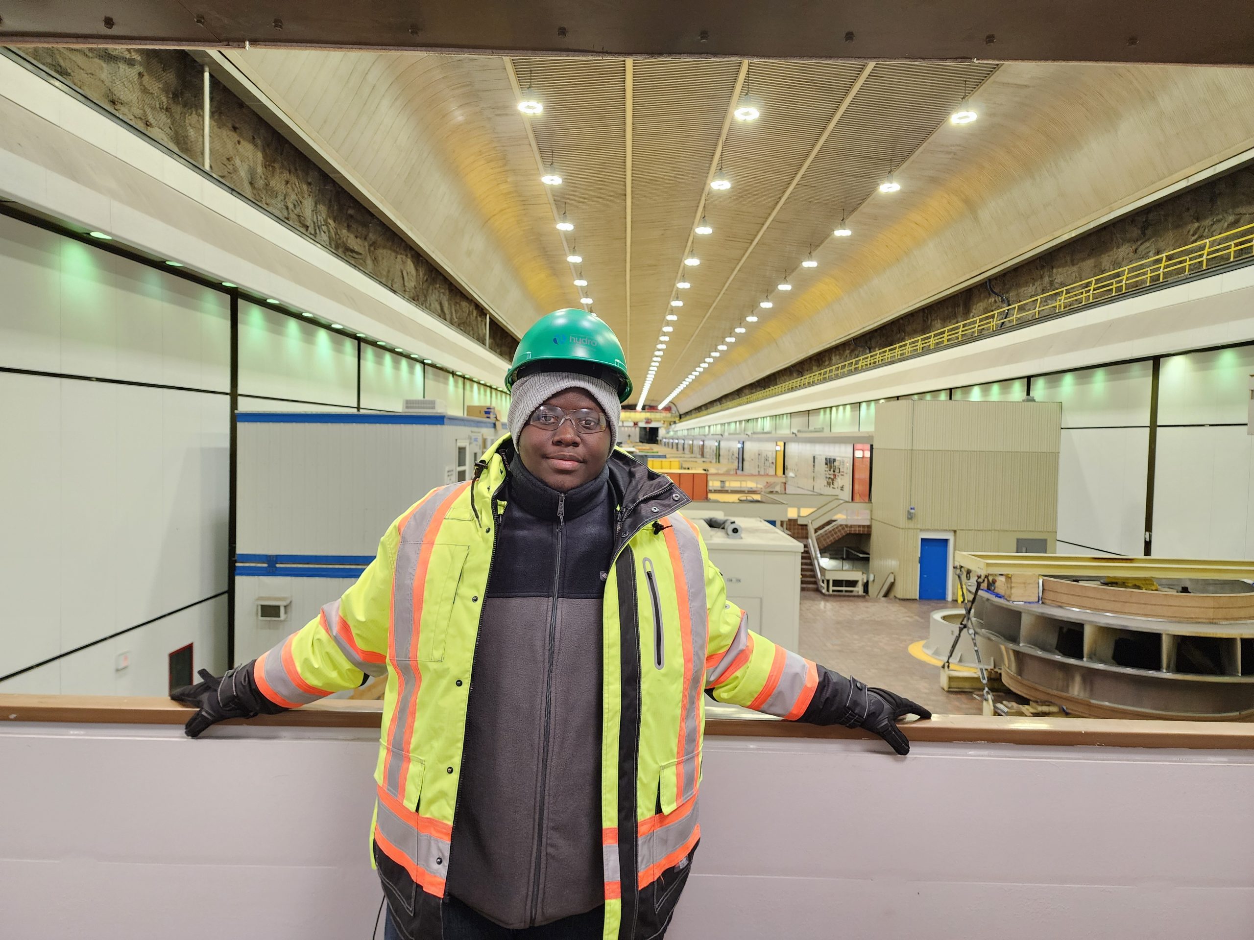 Brian stands in full PPE while in the underground powerhouse at Churchill Falls