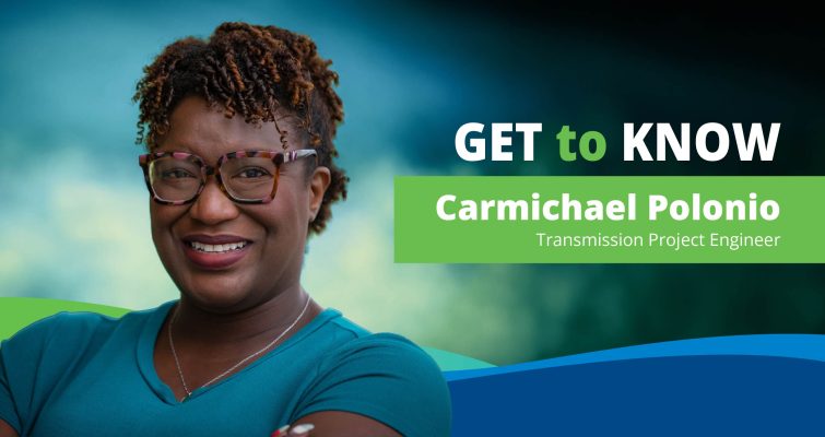 A confident person wearing glasses and a blue shirt is smiling in the foreground. The background features a blurred landscape and bold text with "Get to Know Carmichael Polonio, Transmission Project Engineer."